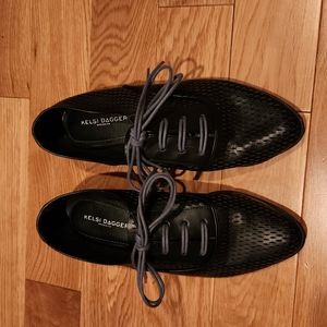 Black vegan leather brogues. Size 9. Contrasting gray laces.